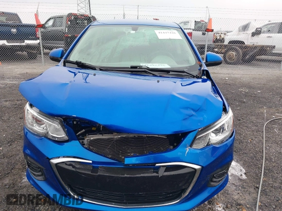 2018 Chevrolet Sonic LT z VIN 1G1JD5SHXJ4120089, wystawiony jako IAAI lot #41447426 z przebiegiem 42 931 mil mil oraz . Historia ofert i sprzedaży dostępna na DreamBid. Obrazek 12.