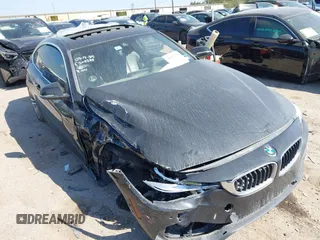 2019 BMW 4 Series 430i with VIN WBA4W3C51KAG91397, listed as a IAAI auction lot 41871270 with 108,701 mi miles and . Bid and sale history available at carsss.com. Image 6.