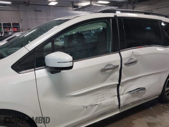 2018 Honda Odyssey Elite with VIN 5FNRL6H96JB027498, listed as a IAAI auction lot 41934458 with 80,653 mi miles. Bid and sale history available at carsss.com. Image 6.