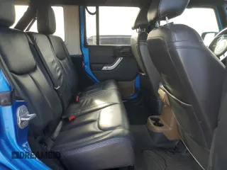 2015 Jeep Wrangler Unlimited Altitude with VIN 1C4BJWEG1FL514848, listed as a Copart auction lot 86474114 with 84,349 mi miles and Salvage title. Bid and sale history available at DreamBid. Image 11.