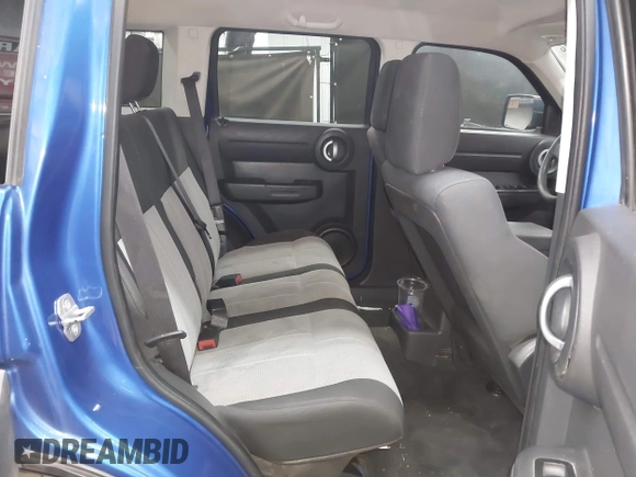 2007 Dodge Nitro SXT with VIN 1D8GT28K47W733488, listed as a IAAI auction lot 42021076 with 120,862 mi miles. Bid and sale history available at carsss.com. Image 8.