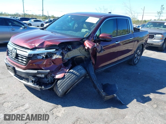 2019 Honda Ridgeline RTL-E with VIN 5FPYK3F72KB024461, listed as a IAAI auction lot 41813568 with 122,364 mi miles and . Bid and sale history available at DreamBid. Image 2.