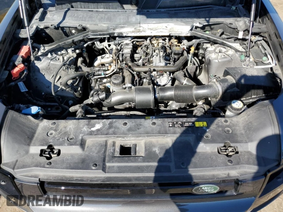 2024 Land Rover Defender S with VIN SALEJ7EX4R2286317, listed as a Copart auction lot 75647954 with 11,710 mi miles and Salvage title. Bid and sale history available at DreamBid. Image 12.