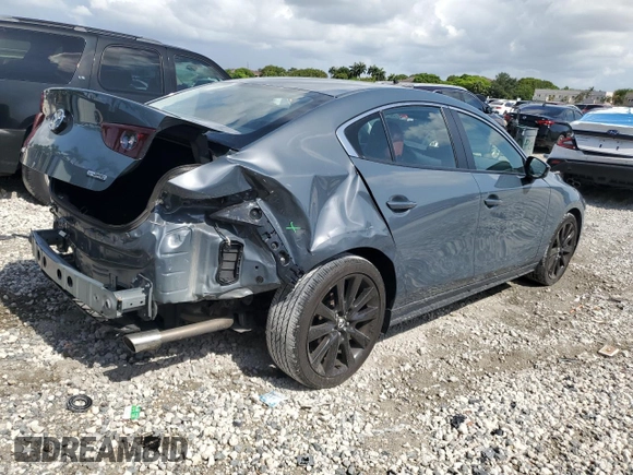 2022 Mazda 3 Carbon Edition с VIN 3MZBPACL3NM318079, выставлен на аукционе Copart как лот 58185015 с пробегом 36 299 миль миль и Списание • Salvage title. История ставок и продаж доступна на DreamBid. Изображение 3.
