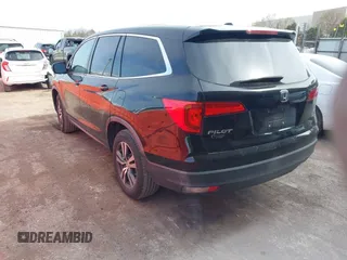2017 Honda Pilot EX-L with VIN 5FNYF5H5XHB005735, listed as a IAAI auction lot 41791678 with 131,480 mi miles. Bid and sale history available at carsss.com. Image 3.
