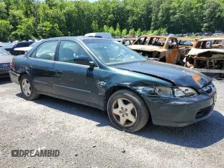 2000 Honda Accord EX с VIN 1HGCG1655YA034444, выставлен на аукционе Copart как лот 58974485 с пробегом 239 959 миль миль и Списание • Salvage title. История ставок и продаж доступна на DreamBid. Изображение 4.