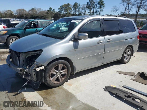 2010 Honda Odyssey Touring with VIN 5FNRL3H97AB096960, listed as a Copart auction lot 49291025 with 167,224 mi miles and Salvage Title. Bid and sale history available at carsss.com. Image 1.