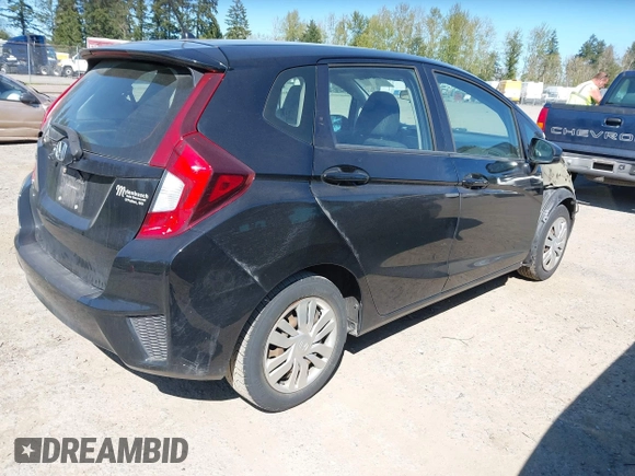 2015 Honda Fit LX with VIN 3HGGK5H58FM765907, listed as a IAAI auction lot 42061158 with 120,178 mi miles. Bid and sale history available at carsss.com. Image 4.