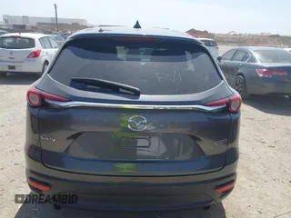 2021 Mazda CX-9 Touring with VIN JM3TCACY2M0502016, listed as a IAAI auction lot 41825456 with 86,068 mi miles and . Bid and sale history available at carsss.com. Image 16.