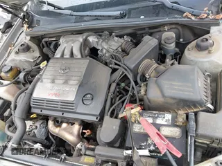 2002 Toyota Avalon XL with VIN 4T1BF28B12U234616, listed as a IAAI auction lot 41954288 with 148,418 mi miles. Bid and sale history available at carsss.com. Image 10.