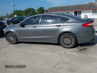 2014 Ford Fusion Titanium with VIN 3FA6P0K90ER358536, listed as a IAAI auction lot 41931474 with 170,856 mi miles. Bid and sale history available at carsss.com. Image 15.