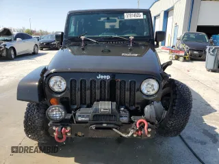 2009 Jeep Wrangler X with VIN 1J4FA24139L730383, listed as a Copart auction lot 51914935 with 168,265 mi miles and Salvage Title. Bid and sale history available at DreamBid. Image 5.