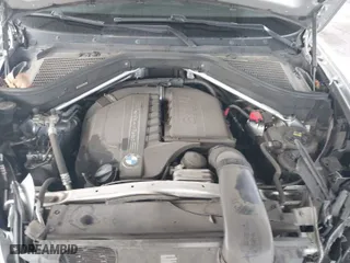 2014 BMW X6 xDrive35i with VIN 5UXFG2C56E0K41592, listed as a IAAI auction lot 41764693 with 67,234 mi miles. Bid and sale history available at carsss.com. Image 10.