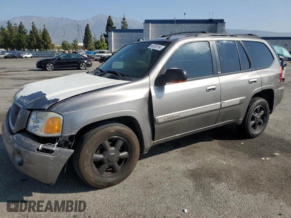 2005 GMC Envoy SLT with VIN 1GKDS13S952382088, listed as a Copart auction lot 64765154 with 177,333 mi miles and Salvage Title. Bid and sale history available at carsss.com. Image 1.