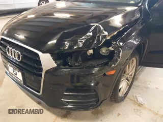 2017 Audi Q3 Premium z VIN WA1ECCFS3HR015665, wystawiony jako IAAI lot #42080113 z przebiegiem 142 149 mil mil oraz . Historia ofert i sprzedaży dostępna na DreamBid. Obrazek 6.