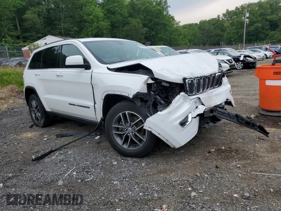 2018 Jeep Grand Cherokee Laredo E with VIN 1C4RJEAGXJC430096, listed as a Copart auction lot 57391405 with 89,248 mi miles and Salvage title. Bid and sale history available at DreamBid. Image 4.