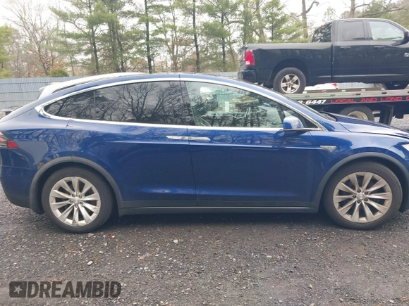 2016 Tesla Model X 70D with VIN 5YJXCBE20GF016173, listed as a IAAI auction lot 41809725 with 116,198 mi miles. Bid and sale history available at carsss.com. Image 13.