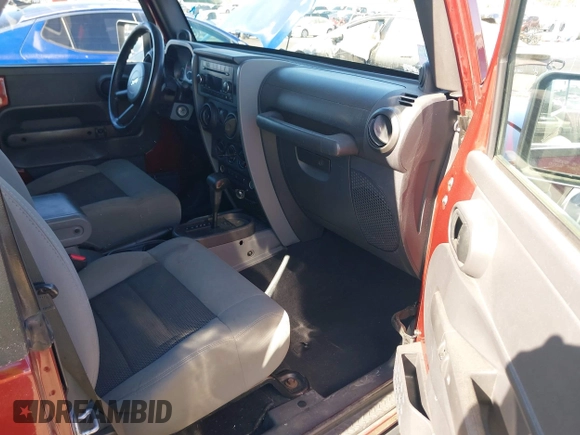 2010 Jeep Wrangler Rubicon with VIN 1J4BA6D17AL126068, listed as a IAAI auction lot 41319076 with 158,888 mi miles and . Bid and sale history available at DreamBid. Image 5.