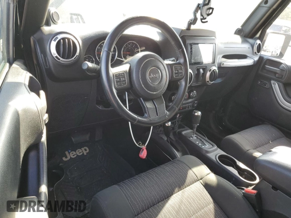 2012 Jeep Wrangler Sahara z VIN 1C4AJWBG6CL236704, wystawiony jako Copart lot #55099555 z przebiegiem 102 180 mil mil oraz Szkoda całkowita • Salvage title. Historia ofert i sprzedaży dostępna na DreamBid. Obrazek 8.
