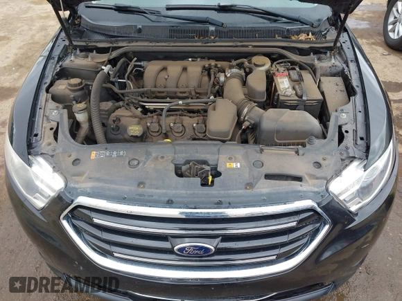 2013 Ford Taurus Limited with VIN 1FAHP2F84DG106350, listed as a IAAI auction lot 41833203 with 195,548 mi miles. Bid and sale history available at carsss.com. Image 10.