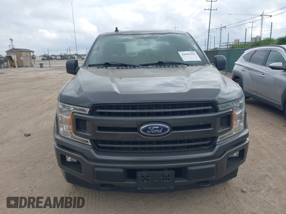 2020 Ford F-150 XL with VIN 1FTEW1E41LKE66857, listed as a IAAI auction lot 42041929 with 76,716 mi miles. Bid and sale history available at carsss.com. Image 12.