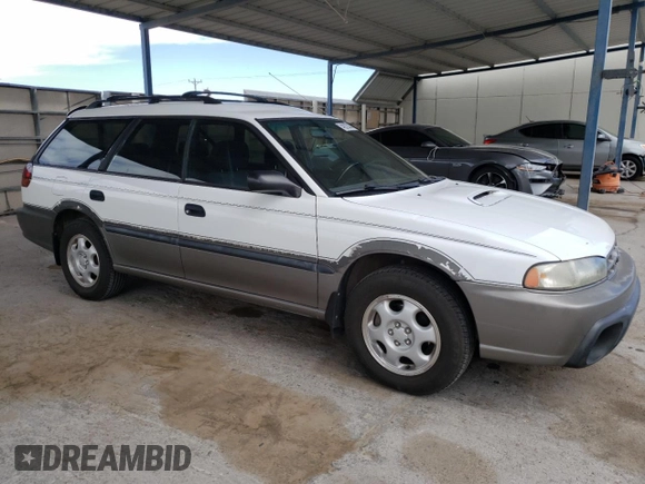 1997 Subaru Legacy Outback with VIN 4S3BG685XV6602836, listed as a Copart auction lot 47376925 with 236,913 mi miles and Salvage title. Bid and sale history available at DreamBid. Image 4.