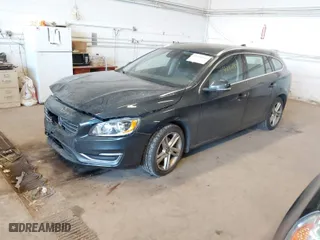 2015 Volvo V60 T5 Drive-E Premier with VIN YV140MEKXF1258073, listed as a IAAI auction lot 41428244 with 57,699 mi miles. Bid and sale history available at carsss.com. Image 2.