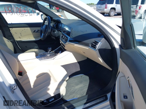 2021 BMW 3 Series 330i xDrive with VIN WBA5R7C0XMFK54525, listed as a IAAI auction lot 42320181 with 54,576 mi miles and . Bid and sale history available at DreamBid. Image 5.