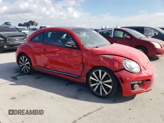2014 Volkswagen Beetle Turbo R-Line with VIN 3VWVT7AT0EM656599, listed as a Copart auction lot 86358334 with 66,050 mi miles and Salvage Title. Bid and sale history available at DreamBid. Image 4.