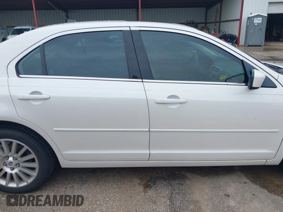 2009 Mercury Milan Premier z VIN 3MEHM08179R604905, wystawiony jako IAAI lot #42200193 z przebiegiem 130 771 mil mil oraz . Historia ofert i sprzedaży dostępna na DreamBid. Obrazek 13.