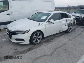 2020 Honda Accord Touring with VIN 1HGCV2F96LA011360, listed as a IAAI auction lot 41192112 with 64,643 mi miles and . Bid and sale history available at DreamBid. Image 18.
