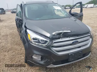 2019 Ford Escape Titanium with VIN 1FMCU0J97KUA34281, listed as a IAAI auction lot 42409579 with 55,400 mi miles and . Bid and sale history available at DreamBid. Image 12.