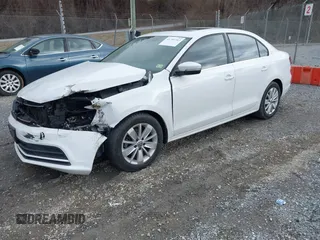 2016 Volkswagen Jetta Sedan 1.4T SE with VIN 3VWD67AJ3GM392427, listed as a IAAI auction lot 41704763 with 84,152 mi miles. Bid and sale history available at carsss.com. Image 18.