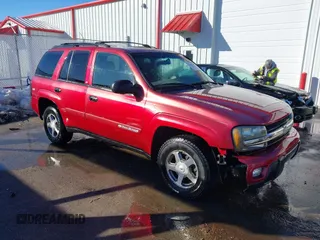 2003 Chevrolet TrailBlazer LS with VIN 1GNDT13S032302058, listed as a IAAI auction lot 41413167 with 179,862 mi miles. Bid and sale history available at carsss.com. Image 1.