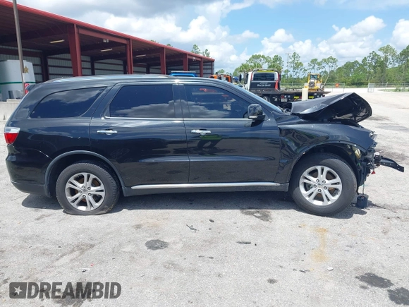 2013 Dodge Durango Crew with VIN 1C4RDHDG9DC684746, listed as a IAAI auction lot 42473302 with 122,602 mi miles and . Bid and sale history available at DreamBid. Image 14.
