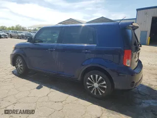 2013 Scion xB with VIN JTLZE4FE2DJ048056, listed as a Copart auction lot 50207675 with 164,209 mi miles and Salvage Title. Bid and sale history available at carsss.com. Image 2.