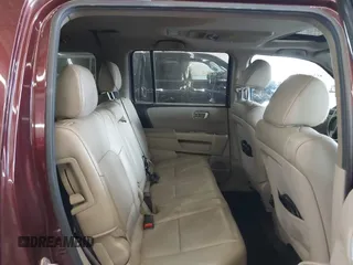 2013 Honda Pilot EX-L with VIN 5FNYF4H62DB044848, listed as a IAAI auction lot 40098280 with 113,829 mi miles and . Bid and sale history available at carsss.com. Image 8.