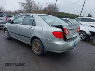 2003 Toyota Corolla CE with VIN 2T1BR32E13C051798, listed as a IAAI auction lot 42009353 with 153,941 mi miles and . Bid and sale history available at DreamBid. Image 3.