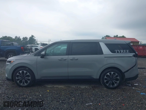 2024 Kia Carnival EX with VIN KNDNC5H31R6377648, listed as a IAAI auction lot 40124659 with 14,386 mi miles and . Bid and sale history available at DreamBid. Image 15.