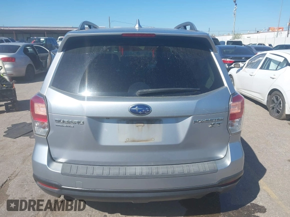 2017 Subaru Forester Touring with VIN JF2SJGTC9HH409665, listed as a IAAI auction lot 41749546 with 118,635 mi miles. Bid and sale history available at carsss.com. Image 16.