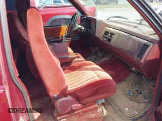 1994 GMC Sierra 1500 z VIN 2GTEK19K4R1561409, wystawiony jako IAAI lot #41903157 z przebiegiem 416 719 mil mil oraz . Historia ofert i sprzedaży dostępna na DreamBid. Obrazek 5.