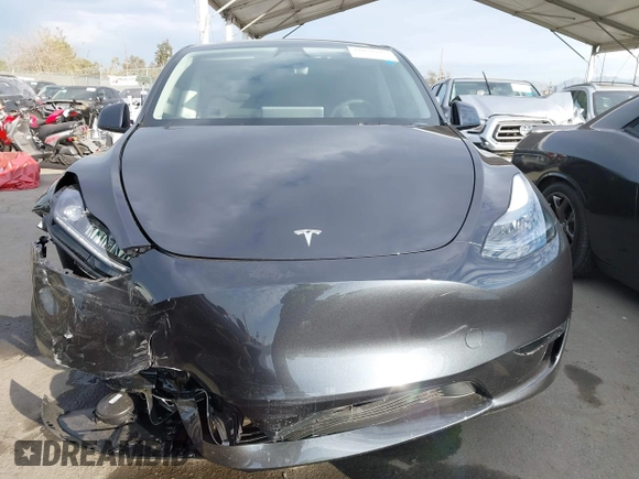 2025 Tesla Model Y Long Range with VIN 7SAYGDED6SF229498, listed as a IAAI auction lot 41086718 with 509 mi miles and . Bid and sale history available at DreamBid. Image 13.