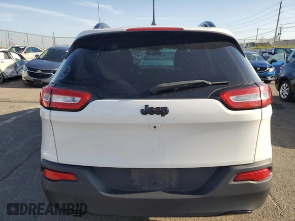 2016 Jeep Cherokee Altitude with VIN 1C4PJLCB1GW237968, listed as a Copart auction lot 52055245 with 99,075 mi miles and Salvage Title. Bid and sale history available at carsss.com. Image 6.