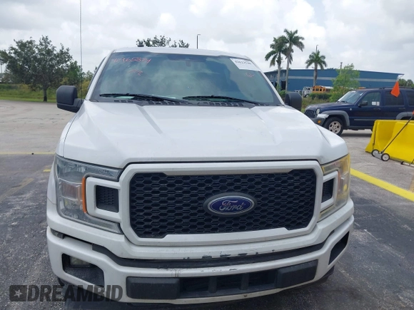 2019 Ford F-150 XL with VIN 1FTEW1CP3KKD55769, listed as a IAAI auction lot 42622540 with 114,317 mi miles and . Bid and sale history available at DreamBid. Image 6.