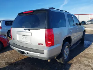 2013 GMC Yukon SLT with VIN 1GKS1CE04DR180881, listed as a IAAI auction lot 41647032 with 187,228 mi miles. Bid and sale history available at carsss.com. Image 4.