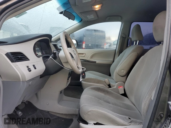 2012 Toyota Sienna with VIN 5TDZK3DC1CS199892, listed as a Copart auction lot 44409615 with 223,327 mi miles and Salvage Title. Bid and sale history available at carsss.com. Image 7.