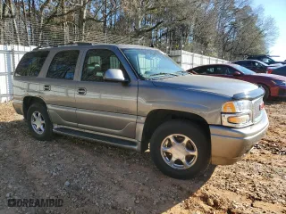 2006 GMC Yukon Denali with VIN 1GKEK63U96J146891, listed as a Copart auction lot 87917065 with 254,497 mi miles and Salvage Title. Bid and sale history available at carsss.com. Image 4.