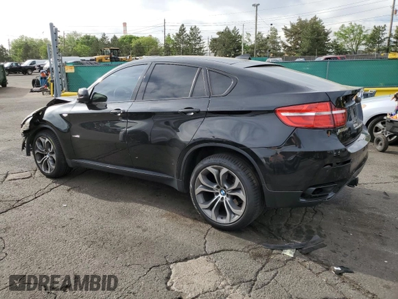2013 BMW X6 xDrive50i z VIN 5UXFG8C57DL591149, wystawiony jako Copart lot #56979865 z przebiegiem 94 251 mil mil oraz Szkoda całkowita • Salvage title. Historia ofert i sprzedaży dostępna na DreamBid. Obrazek 2.