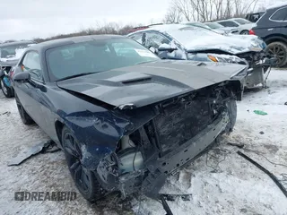 2017 Dodge Challenger SXT Plus z VIN 2C3CDZAG1HH535125, wystawiony jako IAAI lot #41611589 z przebiegiem 56 588 mil mil oraz . Historia ofert i sprzedaży dostępna na DreamBid. Obrazek 1.