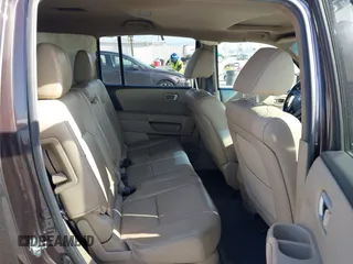2013 Honda Pilot EX-L with VIN 5FNYF3H57DB031983, listed as a IAAI auction lot 41912221 with 148,908 mi miles. Bid and sale history available at carsss.com. Image 8.